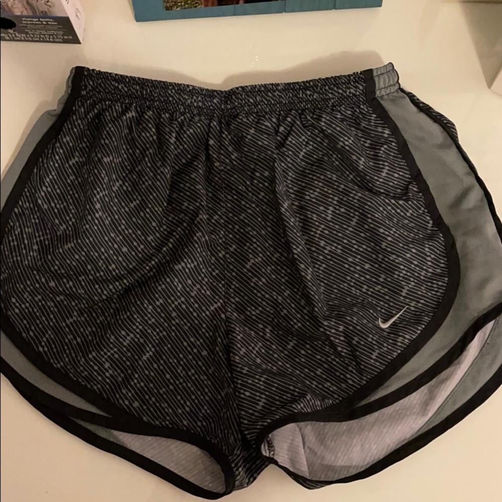 small black/grey patterned nike running shorts